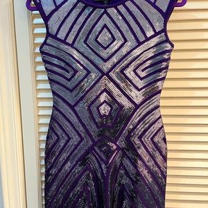 Silver Sleek and sparkly form-fitted mini dress